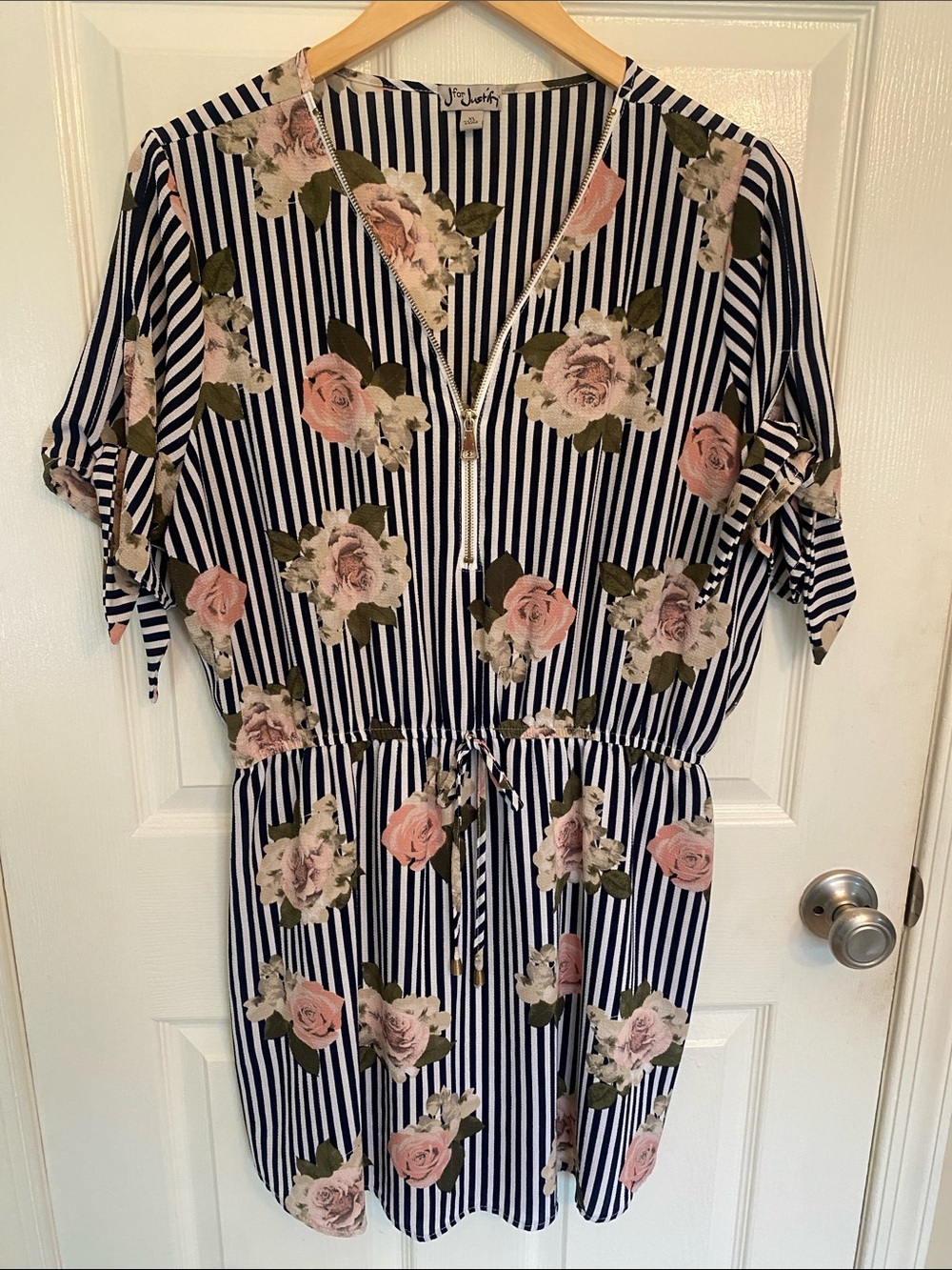 J for Justify Navy Stripe Mini Dress with Pink Floral Print and a gold zipper